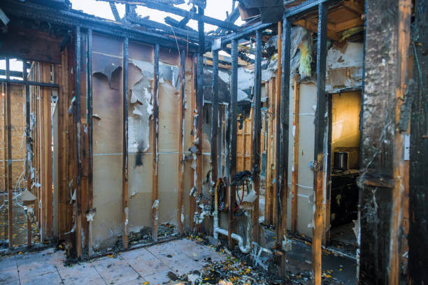 Professional Fire Damage Repair technician working in Roberts, WI